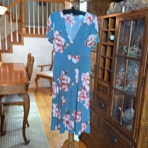 Polyester dress, machine washable.